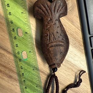 Rustic Brown Wooden Necklace with Intricate Carvings